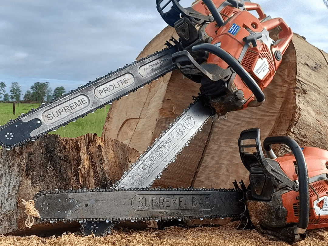 supreme pro & prolite chainsaw bars on chainsaws - showing custom engraving