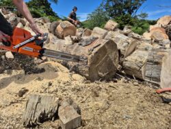 supreme prolite chainsaw bar on a husqvarna chainsaw in action